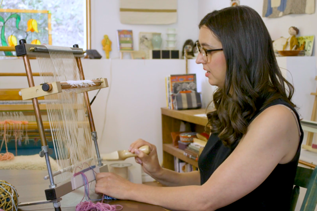 Janna Maria Vallee demonstrating weaving at the School of SweetGeorgia online tapestry course