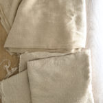 Scoured (bottom) vs unscoured (top) linen
