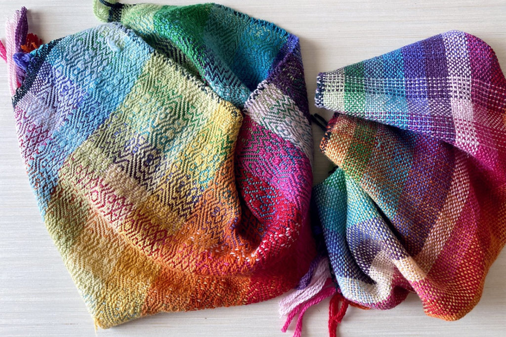 Rainbow colours on woven fabric by Marjoram Lynn
