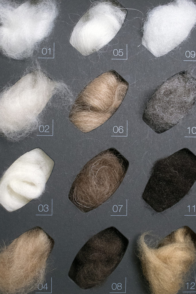 a sampling box of neutral coloured fibres